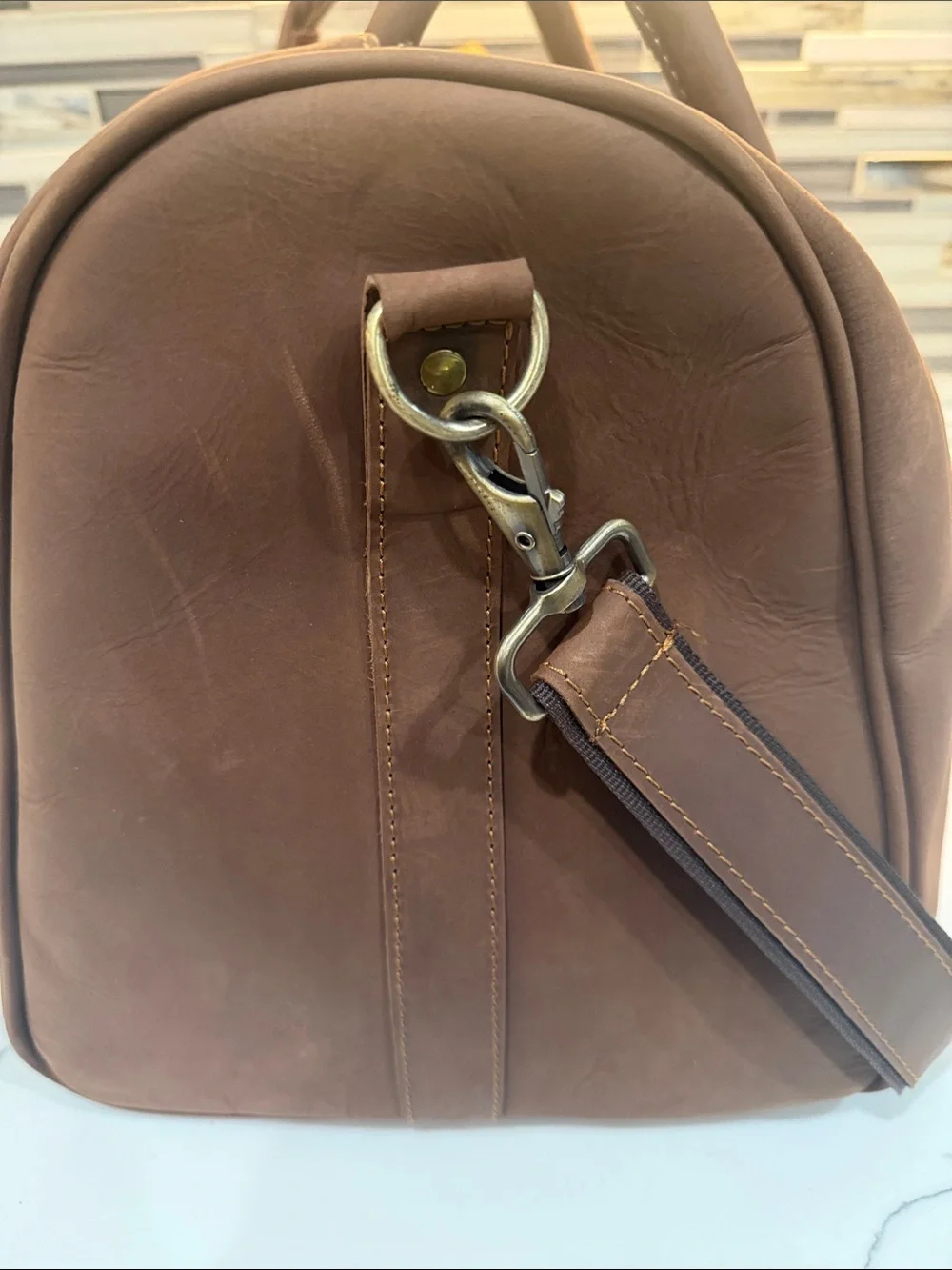 Classic Brown Leather Duffel Bag with Shoulder Strap